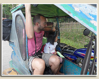 Tricycle allant au port